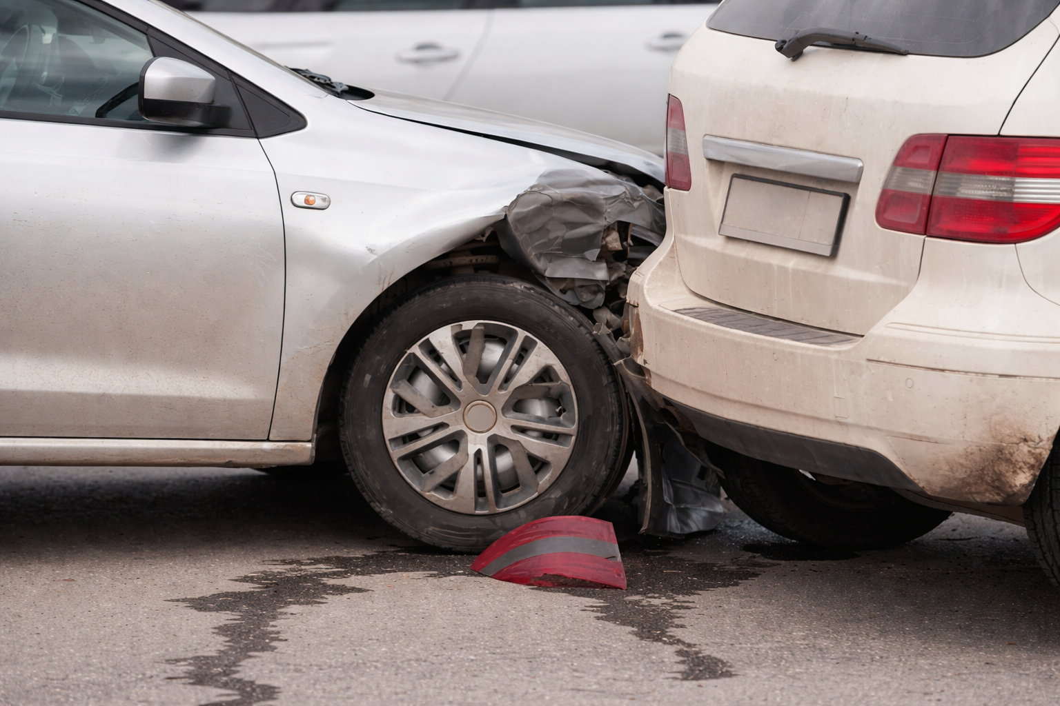 Damaged front end of a car after a collision, highlighting braking issues that can make drivers ask, “why is my car shaking when I brake?”